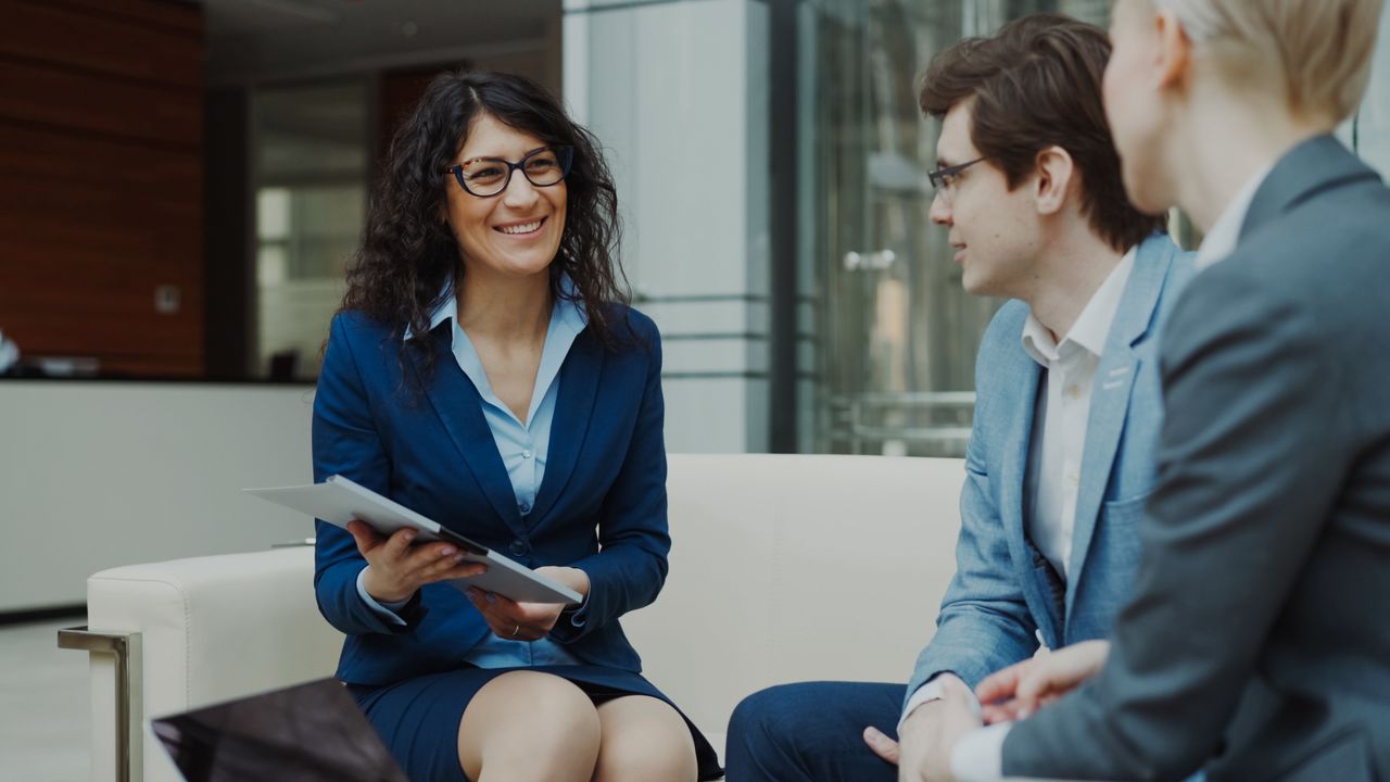 HR professional meeting with an employee
