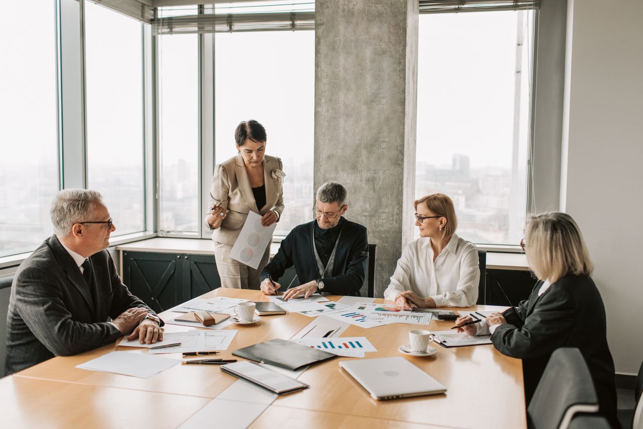 Business professionals discussing an employment matter in an office