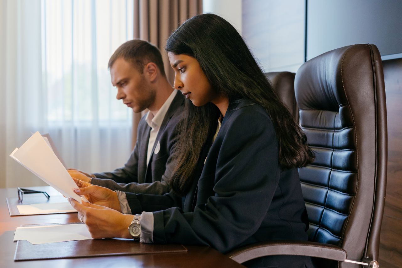 HR professional reviewing policies and documentation